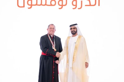 Sheikh Mohammed bin Rashid, Prime Minister and Ruler of Dubai with Reverend Canon Andrew Thompson MBE. Wam