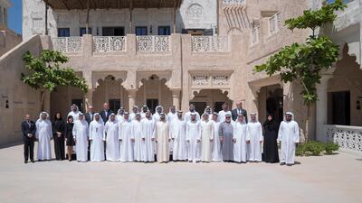 The UAE leaders stand for a group photograph after witnessing the signing of a joint venture agreement between Aldar and Emaar. Mohammed Al Hammadi / Crown Prince Court - Abu Dhabi