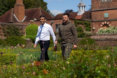 Britain's Prime Minister, Rishi Sunak, and Ukraine's President, Volodymyr Zelenskyy, walk in the garden at Chequers. Getty Images