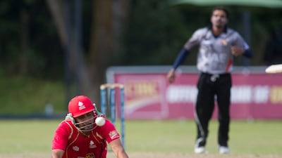 Canada were scrambling for whatever runs they could get. Here, Baidwan dives safely to reach the crease in time. But it was too little too late for the hosts as the UAE had the game tied up. Chris Young / The National