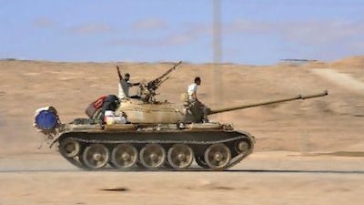 Rebel fighters Tuesday drive towards Sirte, Muammar Qaddafi's hometown and last bastion of his loyalist forces.