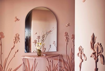 Wedgwood Jasperware-inspired floral artwork in the hallway of the apartment. Photo: Almacantar