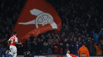 Arsenal's Olivier Giroud, right, celebrates after scoring during their Champions League victory over Bayern Munich on Tuesday night. Kirsty Wigglesworth / AP / October 20, 2015