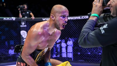 Emilio Quissua celebrates light heavyweight title win at UAE Warriors Africa.