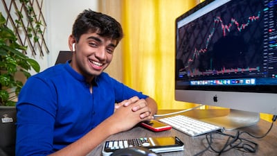 Advait Arya, a 16-year-old student in Abu Dhabi, started trading in the stock market with Dh8,000 to keep himself occupied during the summer break and Covid-19-induced mobility restrictions last year. Victor Besa / The National