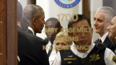 Former President Barack Obama arrives for jury duty at the Daley Center, in Chicago. Kevin Tanaka/Sun Times via AP