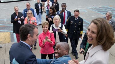 Ralph Northam gets a hug form a supporter. He won the race for Virginia governor. AP Photo/Steve Helber
