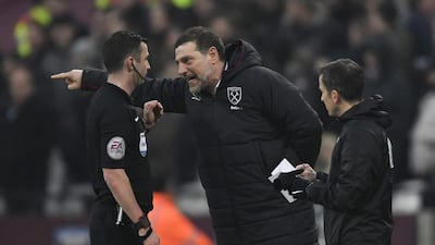 The England FA have charged West Ham United manager Slaven Bilic, above, and his assistant Nikola Jurcevic for their actions with referee Michael Oliver in their match Saturday, February 11, against West Bromwich. Tony O'Brien / Reuters