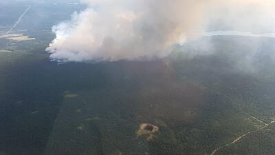 British Columbia wildfires seen near 100 Mile House in British Columbia, Canada (BC Wildfire Service/REUTERS)