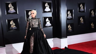 Lady Gaga is known for theatrical Grammys looks (that egg will never be forgotten), and while this Armani Prive gown is certainly dramatic, it's still quite pared down for the artist. It's romantic, a touch period and still quite Gaga (with the mega-platforms and all). Angela Weiss / AFP