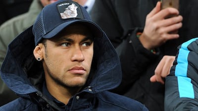 Neymar of Barcelona shown in the stands during their Champions League win over Bayer Leverkusen on Wednesday night. Guildo Kirchner / EPA / December 9, 2015