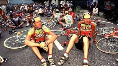 Riders in the 1998 Tour de France take part in a sit-down protest following the drugs scandal.