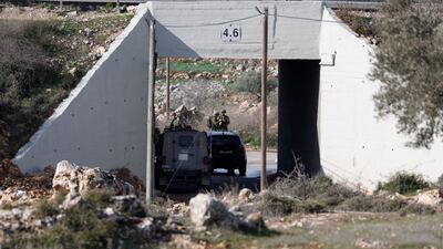 Israeli soldiers at the scene of an incident near Ramallah in the Israeli-occupied West Bank. Reuters