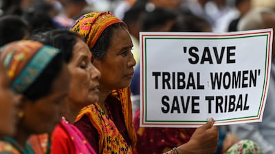 Members of a tribal community during a protest in New Delhi over violence against women and for peace in the north-east state of Manipur. AFP
