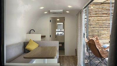 Each trailer comes with a bathroom, kitchenette, lounge area, bedroom and viewing deck. Courtesy Meraas