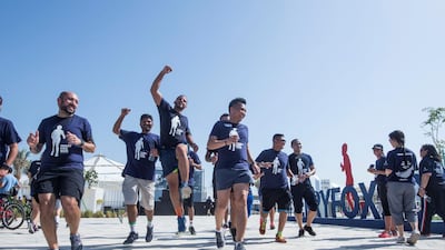 Finishers cheer as they cross the line.