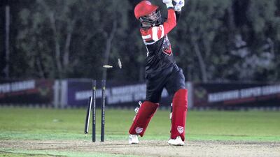 Panthers' Ronak Panoly is bowled by Tiger's Harikrishnan Valloli during the Karwan Rising Stars F40 Final. Chris Whiteoak / The National