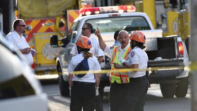 Search and Rescue paramedics prepare to go into Marco Polo apartment building after a fire broke out in it in Honolulu, Hawaii. Hugh Gentry / Reuters