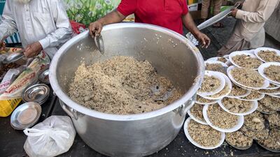 Iftar meals distributed at the New Fatima Mosque adjacent to the Al Ghubaiba Bus Station in Bur Dubai. Antonie Robertson / The National