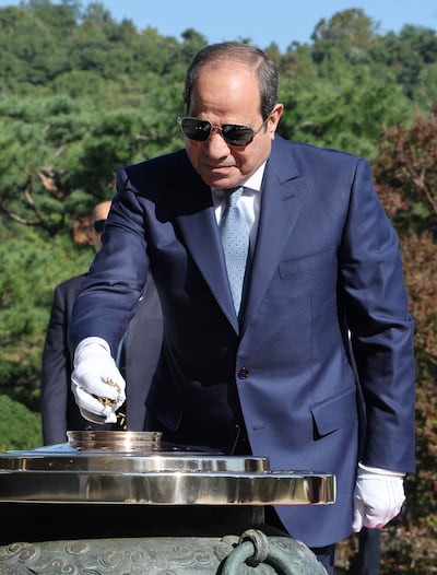 Egyptian President Abdel Fattah El Sisi at the National Cemetery in Seoul. His current term ends in 2030. EPA