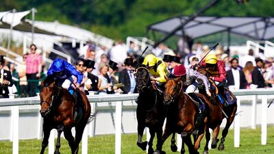Coroebus, left, ridden by William Buick on their way to victory in The St James's Palace Stakes at Royal Ascot. PA