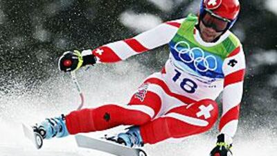 Switzerland's veteran skier, Didier Defago, speeding to a surprise victory in the men's downhill at Whistler on Monday.