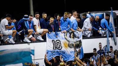 Argentina players are greeted by fans after wrriving homre from the World Cup in Qatar. Reuters