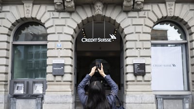 Financial markets are reacting after troubled bank Credit Suisse was rescued in a $3.23 billion purchase by its Swiss rival UBS in a government-backed deal. EPA