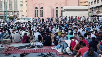 Iftar meals distributed to the poor at the New Fatima Mosque adjacent to the Al Ghubaiba Bus Station in Bur Dubai. Antonie Robertson / The National