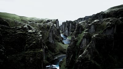 Fjaðrárgljúfur, a canyon in south-east Iceland, which is up to 100m deep and about 2km long. Black Tomato