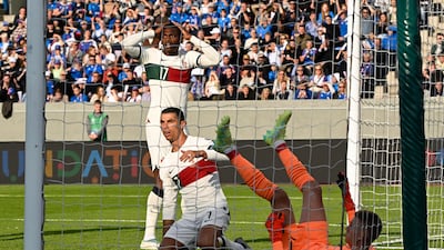 Portugal forward Cristiano Ronaldo reacts after a missed attempt on goal. AFP