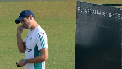 England captain Alastair Cook applies sunscreen during a training session at the Brabourne Stadium in Mumbai on November 4, 2016. England play a five-match Test series against India with the first Test at Rajkot from November 9-13. Indranil Mukherjee / AFP