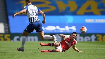 Arsenal's Hector Bellerin in action with Brighton & Hove Albion's Dan Burn. Reuters