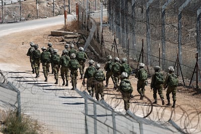 Israeli soldiers patrolling near the Israeli-occupied Golan Heights village of Majdal Shams. EPA