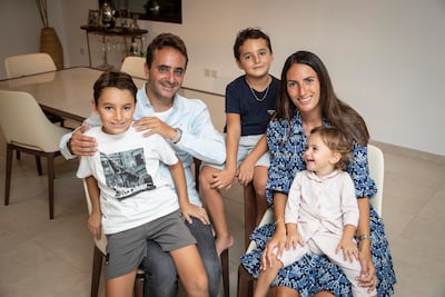 Parisians Kelly and Roy Masliah with their children in their Dubai home. The support of a growing community of Jewish people in the UAE was key to their decision to relocate from France. Antonie Robertson / The National