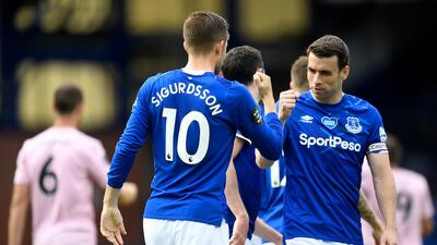 Everton's Gylfi Sigurdsson, left, reacts after scoring his side's second goal at Goodison Park. AP