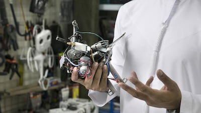 Ahmed Al Mazroei's camel racing robot, above, won him a gold medal from the International Invention Fair hosted by the Kuwait Science Club in 2010. Silvia Razgova / The National