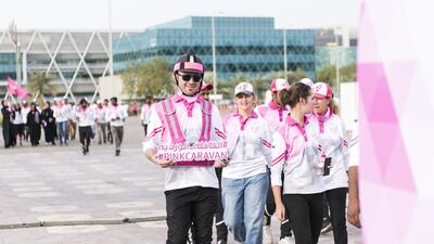 Participants walk around Zayed Sports City in Abu Dhabi on March 17, 2017, during a final event for Pink Caravan Ride 2017. Reem Mohammed / The National / March 17, 2017