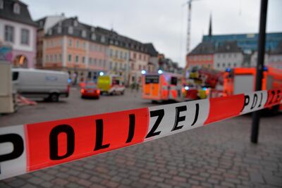 Police on the scene in Trier, Germany, after a car ploughed through a pedestrian zone. AP