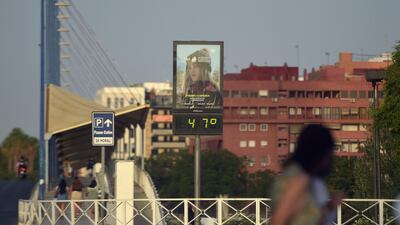A street thermometer reading 47ºC during a heatwave, in Seville, Spain, in August. AFP