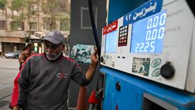 Customers at a petrol station in Cairo. Getty Images