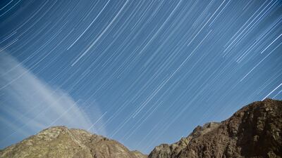 Leonid meteors streak through the sky over Hora Mountain in China's Xinjiang region in 2021. Getty Images
