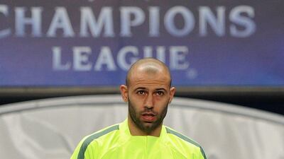 Barcelona's Javier Mascherano attends Monday's training session for their Tuesday encounter with Manchester City in the Champions League. Peter Powell / EPA