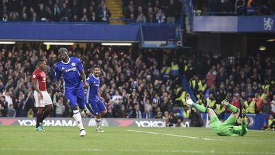 Chelsea’s N’Golo Kante, second left, reacts after scoring the fourth goal. Facundo Arrizabalaga / EPA
