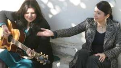 Haniya Aslam (left) and Zebunisa Bangash have the distinction of being Pakistan's first and only all-female band.