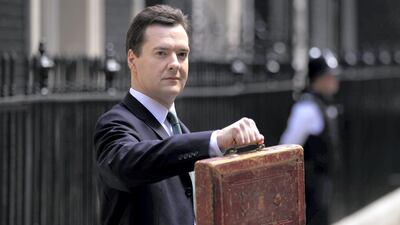 George Osborne holds Gladstone's original budget box as he leaves 11 Downing Street for Parliament in June 2010. Getty Images