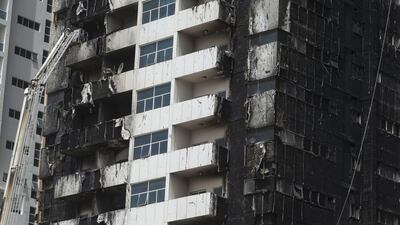 Civil defence continues to contain the fire. Antonie Robertson / The National