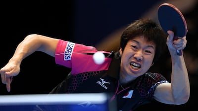 Jun Mizutani of Japan in action against Ho Kwan Kit of Hong Kong during Day 1 of the 2016 Table Tennis Asian Cup at Dubai World Trade Centre on April 28, 2016 in Dubai. (Photo by Warren Little/Getty Images)