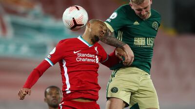 Oli McBurnie - 7: Wasted a chance to put his side two goals up but caused the defence trouble all night. Looks ungainly but worried Liverpool with his physicality. Pushed Fabinho and Gomez around. AFP