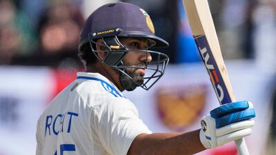 India captain Rohit Sharma celebrates his century in Dharamsala. AP